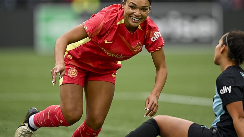 Mar 24, 2024; Portland, Oregon, USA; Portland Thorns FC forward Sophia Smith (9) smiles during the first half against NJ/NY Gotham FC at Providence Park. Mandatory Credit: Troy Wayrynen-USA TODAY Sports