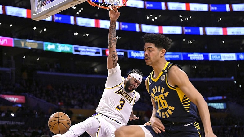 Mar 24, 2024; Los Angeles, California, USA;   Los Angeles Lakers forward Anthony Davis (3) reacts after he gets past Indiana Pacers guard Ben Sheppard (26) for a dunk in the second half at Crypto.com Arena. Mandatory Credit: Jayne Kamin-Oncea-USA TODAY Sports