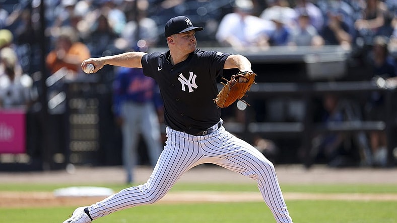 Mar 25, 2024; Tampa, Florida, USA;  New York Yankees starting pitcher Clarke Schmidt (36) throws a pitch against the New York Mets in the first inning at George M. Steinbrenner Field. Mandatory Credit: Nathan Ray Seebeck-USA TODAY Sports