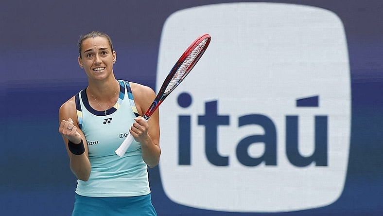 Mar 25, 2024; Miami Gardens, FL, USA; Caroline Garcia (FRA) celebrates after match point against Coco Gauff (USA) (not pictured) on day eight of the Miami Open at Hard Rock Stadium. Mandatory Credit: Geoff Burke-USA TODAY Sports