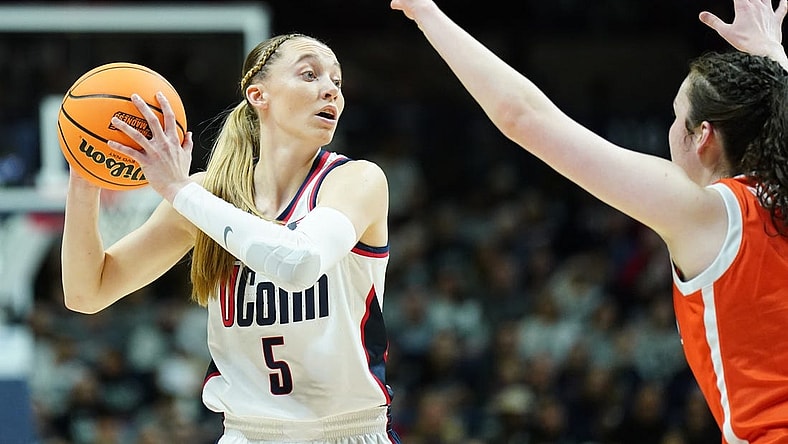 Mar 25, 2024; Storrs, Connecticut, USA; UConn Huskies guard Paige Bueckers (5) looks for an opening against the Syracuse Orange in the first half at Harry A. Gampel Pavilion. Mandatory Credit: David Butler II-USA TODAY Sports