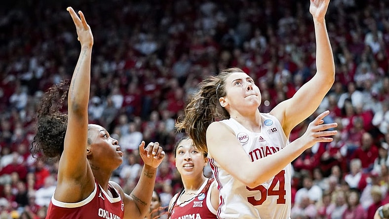 Indiana Hoosiers forward Mackenzie Holmes (54) scores the ball during the NCAA tournament second round game against the Oklahoma Sooners at Simon Skjodt Assembly Hall on Monday, March 25, 2024.