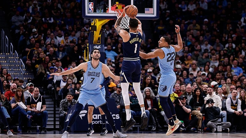 Mar 25, 2024; Denver, Colorado, USA; Denver Nuggets forward Michael Porter Jr. (1) attempts a three point shot against Memphis Grizzlies guard Desmond Bane (22) and forward Santi Aldama (7) in the first quarter at Ball Arena. Mandatory Credit: Isaiah J. Downing-USA TODAY Sports