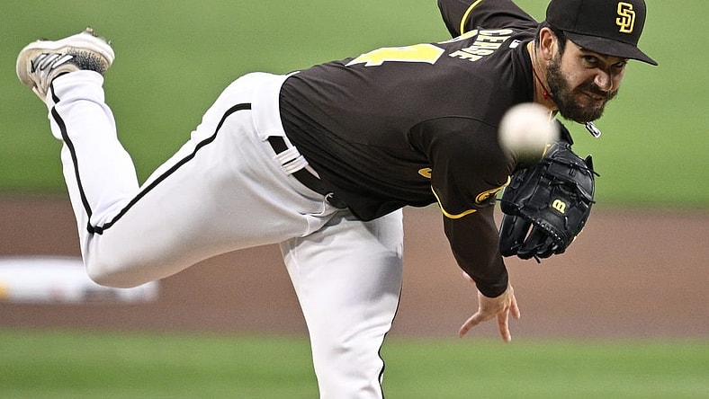 Mar 25, 2024; San Diego, California, USA; San Diego Padres starting pitcher Dylan Cease (84) throws a pitch against the Seattle Mariners during the first inning at Petco Park. Mandatory Credit: Orlando Ramirez-USA TODAY Sports