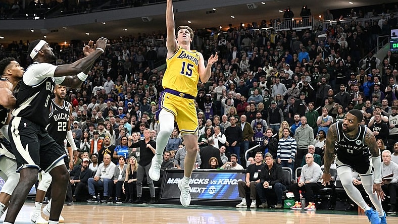 Mar 26, 2024; Milwaukee, Wisconsin, USA; Los Angeles Lakers guard Austin Reaves (15) drives to the basket in the second half at Fiserv Forum. Mandatory Credit: Michael McLoone-USA TODAY Sports