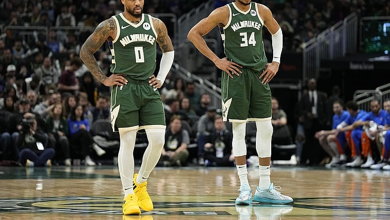Mar 24, 2024; Milwaukee, Wisconsin, USA;  Milwaukee Bucks forward Giannis Antetokounmpo (34) and guard Damian Lillard (0) during the game against the Oklahoma City Thunder at Fiserv Forum. Mandatory Credit: Jeff Hanisch-USA TODAY Sports