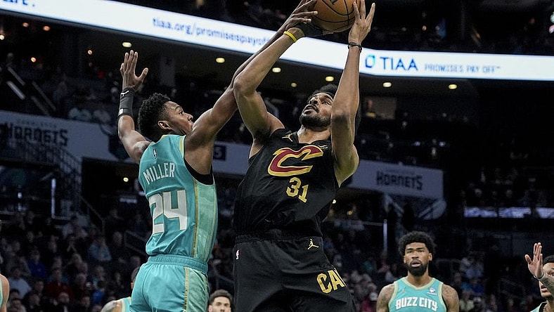 Mar 27, 2024; Charlotte, North Carolina, USA; Cleveland Cavaliers center Jarrett Allen (31) goes up for a shot against Charlotte Hornets forward Brandon Miller (24) during the first quarter at Spectrum Center. Mandatory Credit: Jim Dedmon-USA TODAY Sports