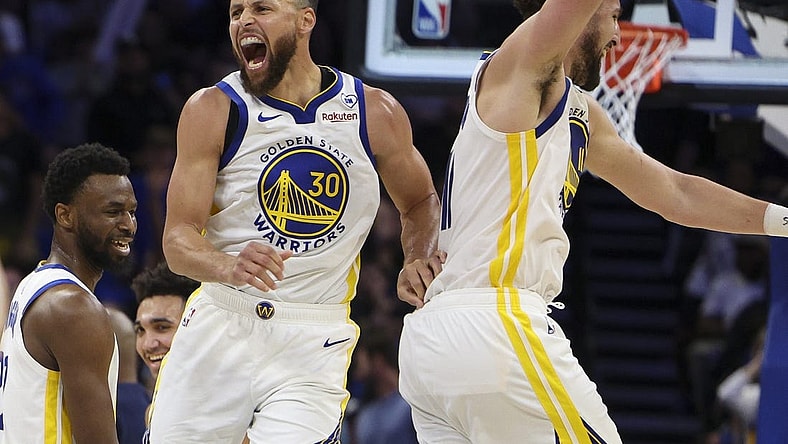 Mar 27, 2024; Orlando, Florida, USA;  Golden State Warriors guard Stephen Curry (30) celebrates with guard Klay Thompson (11) after beating the Orlando Magic at the Kia Center. Mandatory Credit: Nathan Ray Seebeck-USA TODAY Sports