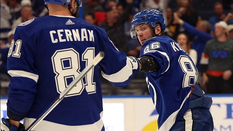 Mar 27, 2024; Tampa, Florida, USA; Tampa Bay Lightning right wing Nikita Kucherov (86) is congratulated after he scored a goal against the Boston Bruins during the third period at Amalie Arena. Mandatory Credit: Kim Klement Neitzel-USA TODAY Sports
