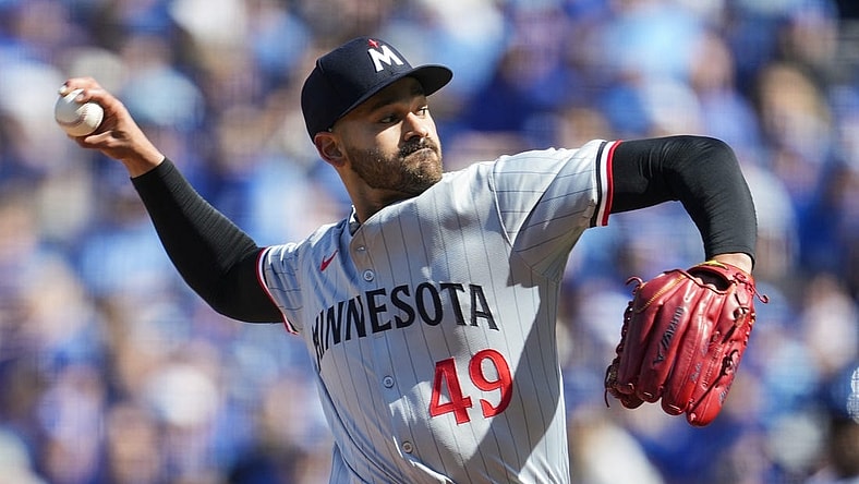 Mar 28, 2024; Kansas City, Missouri, USA; Minnesota Twins starting pitcher Pablo Lopez (49) pitches during the first inning against the Kansas City Royals at Kauffman Stadium. Mandatory Credit: Jay Biggerstaff-USA TODAY Sports