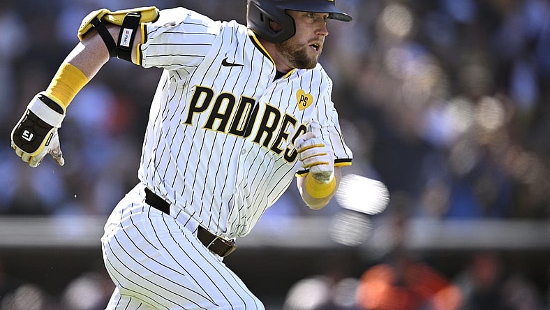 Mar 28, 2024; San Diego, California, USA; San Diego Padres first baseman Jake Cronenworth (9) watches his two-RBI double against the San Francisco Giants during the seventh inning at Petco Park. Mandatory Credit: Orlando Ramirez-USA TODAY Sports