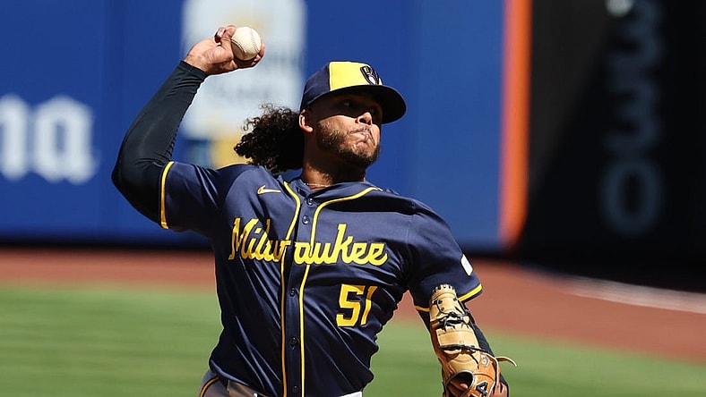 Mar 29, 2024; New York City, New York, USA; Milwaukee Brewers starting pitcher Freddy Peralta (51) delivers a pitch  during the first inning against the New York Mets at Citi Field. Mandatory Credit: Vincent Carchietta-USA TODAY Sports