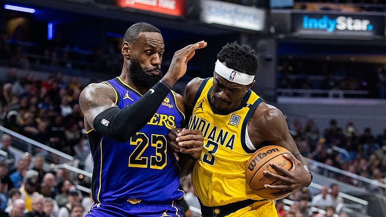 Mar 29, 2024; Indianapolis, Indiana, USA; Indiana Pacers forward Pascal Siakam (43) shoots the ball while Los Angeles Lakers forward LeBron James (23) defends in the first half at Gainbridge Fieldhouse. Mandatory Credit: Trevor Ruszkowski-USA TODAY Sports