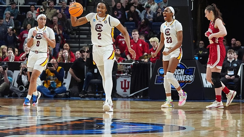 Mar 29, 2024; Albany, NY, USA; South Carolina Gamecocks forward Ashlyn Watkins (2) celebrates the victory over the Indiana Hoosiers in the semifinals of the Albany Regional of the 2024 NCAA Tournament at the MVP Arena. Mandatory Credit: Gregory Fisher-USA TODAY Sports
