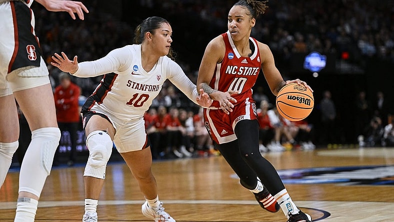 Mar 29, 2024; Portland, OR, USA; NC State Wolfpack guard Aziaha James (10) drives to the basket during the first half against Stanford Cardinal guard Talana Lepolo (10) in the semifinals of the Portland Regional of the 2024 NCAA Tournament at the Moda Center at the Moda Center. Mandatory Credit: Troy Wayrynen-USA TODAY Sports