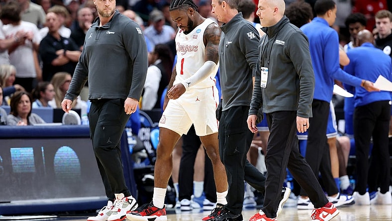 Mar 29, 2024; Dallas, TX, USA; Houston Cougars guard Jamal Shead (1) walks off the floor after an injury during the first half in the semifinals of the South Regional of the 2024 NCAA Tournament against the Duke Blue Devils at American Airlines Center. Mandatory Credit: Kevin Jairaj-USA TODAY Sports