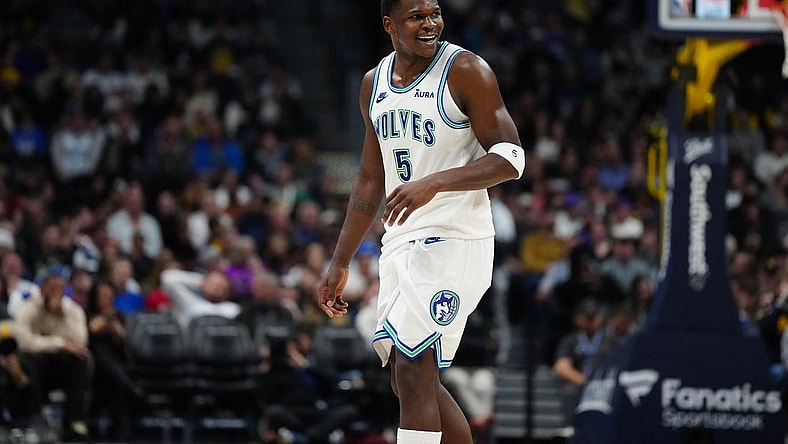 Mar 29, 2024; Denver, Colorado, USA; Minnesota Timberwolves guard Anthony Edwards (5) reacts in the second half against the Denver Nuggets at Ball Arena. Mandatory Credit: Ron Chenoy-USA TODAY Sports