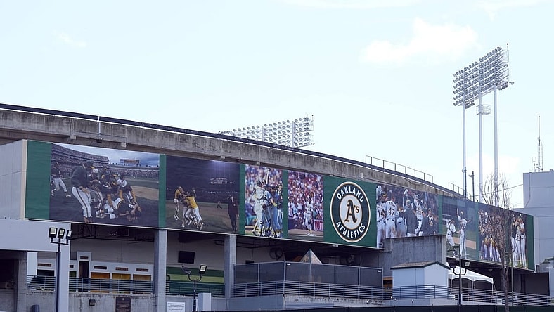 Mar 30, 2024; Oakland, California, USA; A mural on the outside of the stadium that replaced the Rooted in Oakland sign as seen before the game between the Oakland Athletics and the Cleveland Guardians at Oakland-Alameda County Coliseum. Mandatory Credit: Darren Yamashita-USA TODAY Sports