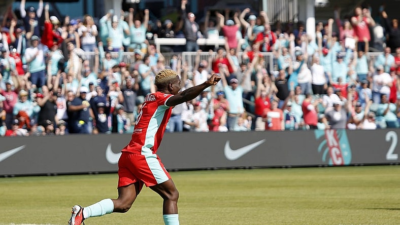 Mar 30, 2024; Kansas City, Missouri, USA; Kansas City Current forward Temwa Chawinga (6) celebrates after scoring a goal against Angel City FC during the second half at CPKC Stadium. Mandatory Credit: Kylie Graham-USA TODAY Sports