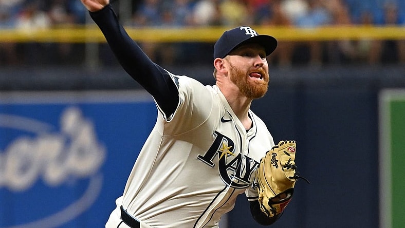 Mar 30, 2024; St. Petersburg, Florida, USA; Tampa Bay Rays starting pitcher Zack Littell (52) throws a pitch in the first inning of the game against the Toronto Blue Jays   at Tropicana Field. Mandatory Credit: Jonathan Dyer-USA TODAY Sports