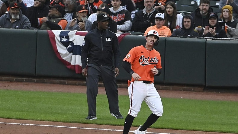 Mar 30, 2024; Baltimore, Maryland, USA; ]Baltimore Orioles left fielder Austin Hays (21) reacts after hitting a sixth inning  rbi single against the Los Angeles Angels  at Oriole Park at Camden Yards. Mandatory Credit: Tommy Gilligan-USA TODAY Sports