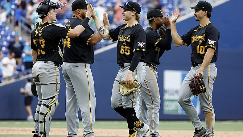 Mar 30, 2024; Miami, Florida, USA; The Pittsburgh Pirates celebrate after defeating the Miami Marlins following the game at loanDepot Park. Mandatory Credit: Rhona Wise-USA TODAY Sports