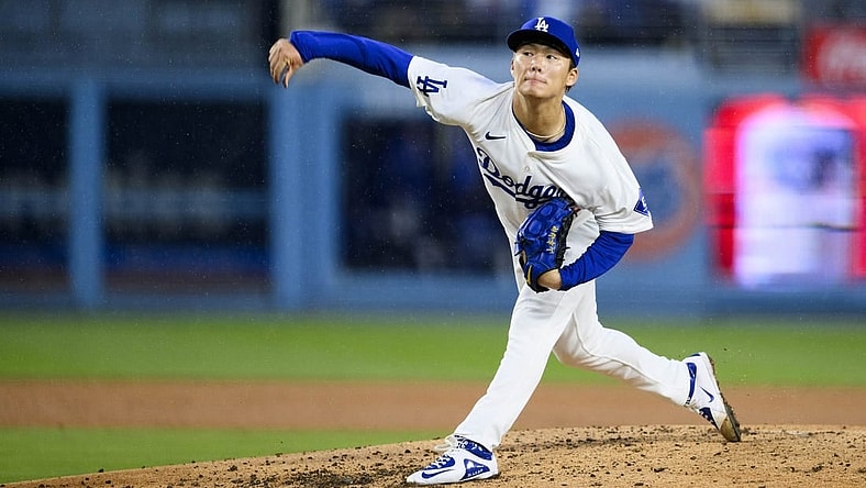 Mar 30, 2024; Los Angeles, California, USA; Los Angeles Dodgers starting pitcher Yoshinobu Yamamoto (18) throws out a pitch during the fourth inning against the St. Louis Cardinals at Dodger Stadium. Mandatory Credit: Kelvin Kuo-USA TODAY Sports