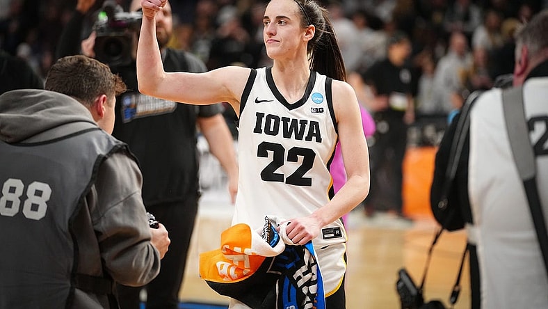 Iowa Hawkeyes guard Caitlin Clark (22) gives a thumbs up to the crowd after the Sweet 16 round of the NCAA Women's Basketball Tournament at MVP Arena, Saturday, March 30, 2024 in Albany, N.Y.