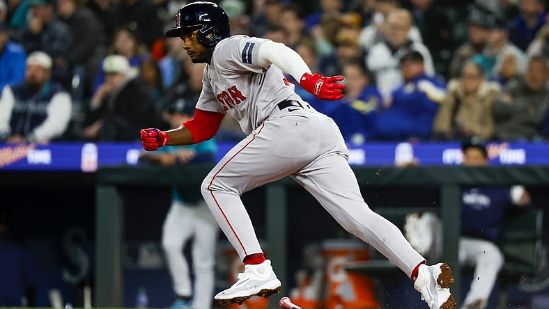 Mar 30, 2024; Seattle, Washington, USA; Boston Red Sox third baseman Pablo Reyes (19) hits an RBI-fielders choice against the Seattle Mariners during the fifth inning at T-Mobile Park. Mandatory Credit: Joe Nicholson-USA TODAY Sports