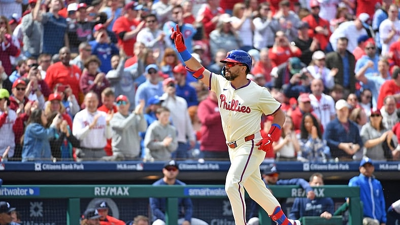 Mar 31, 2024; Philadelphia, Pennsylvania, USA; Philadelphia Phillies designated hitter Kyle Schwarber (12) celebrates his home run during the first inning against the Atlanta Braves at Citizens Bank Park. Mandatory Credit: Eric Hartline-USA TODAY Sports