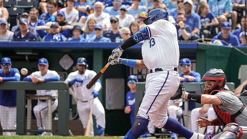Mar 31, 2024; Kansas City, Missouri, USA; Kansas City Royals first baseman Salvador Perez (13) hits a one RBI single against the Minnesota Twins in the second inning at Kauffman Stadium. Mandatory Credit: Denny Medley-USA TODAY Sports