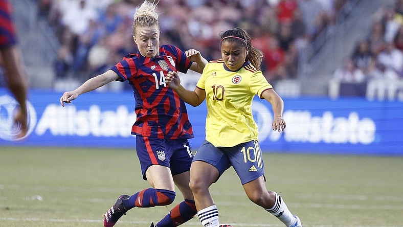 Jun 28, 2022; Sandy, Utah, USA; USA defender Emily Sonett (14) and Columbia midfielder Leicy Santos (10) battle in the first half during an international friendly soccer match at Rio Tinto Stadium. Mandatory Credit: Jeffrey Swinger-USA TODAY Sports