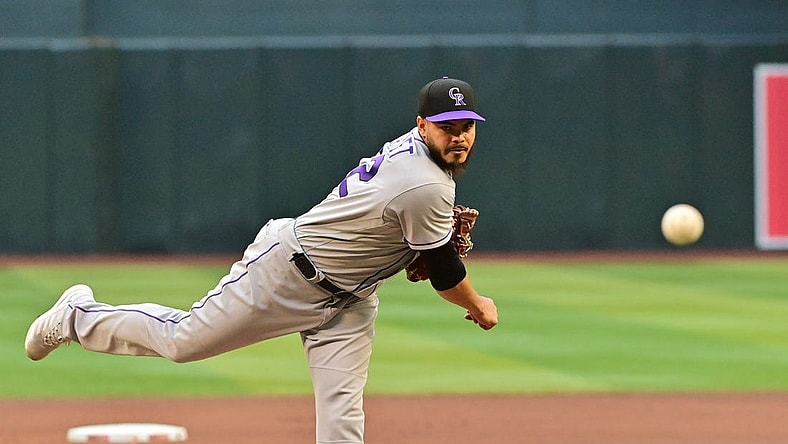 May 31, 2023; Phoenix, Arizona, USA;  Colorado Rockies starting pitcher Dinelson Lamet (32) throws in the first inning against the Arizona Diamondbacks at Chase Field. Mandatory Credit: Matt Kartozian-USA TODAY Sports