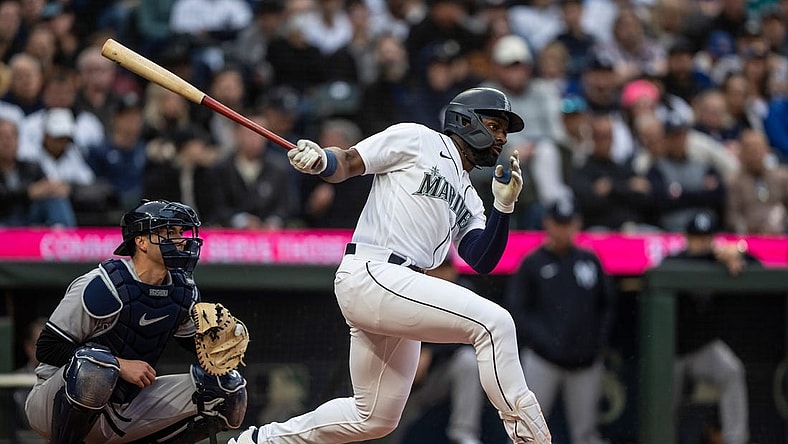 May 31, 2023; Seattle, Washington, USA; Seattle Mariners designated hitter Taylor Trammell (5) takes a swing during an at-bat against the New York Yankees at T-Mobile Park. Mandatory Credit: Stephen Brashear-USA TODAY Sports