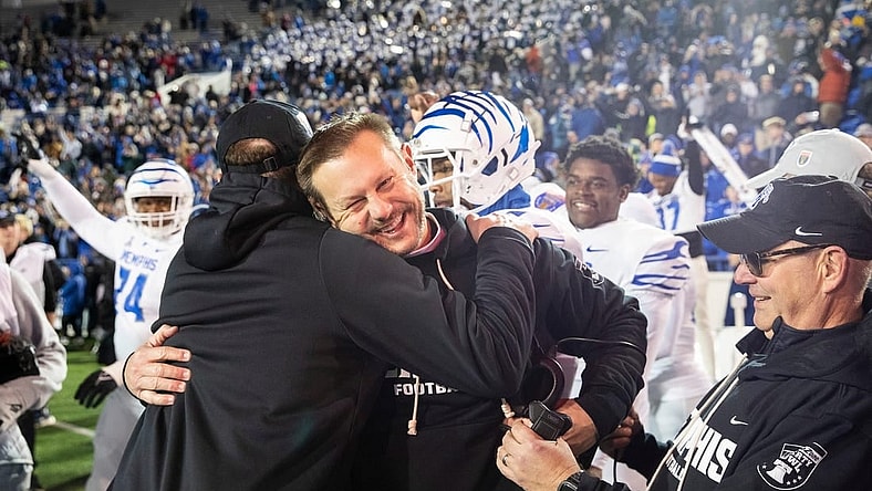Memphis' head coach Ryan Silverfield celebrates with his team after they defeated Iowa State 36-26 in the AutoZone Liberty Bowl at Simmons Bank Liberty Stadium on Dec. 29, 2023.