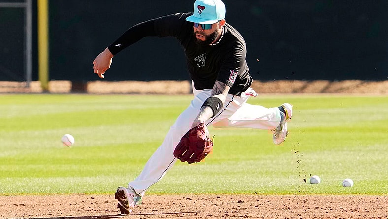 Arizona Diamondbacks' Emmanuel Rivera fields a ground ball during spring training workouts at Salt River Fields at Talking Stick in Scottsdale on Feb. 22, 2024.