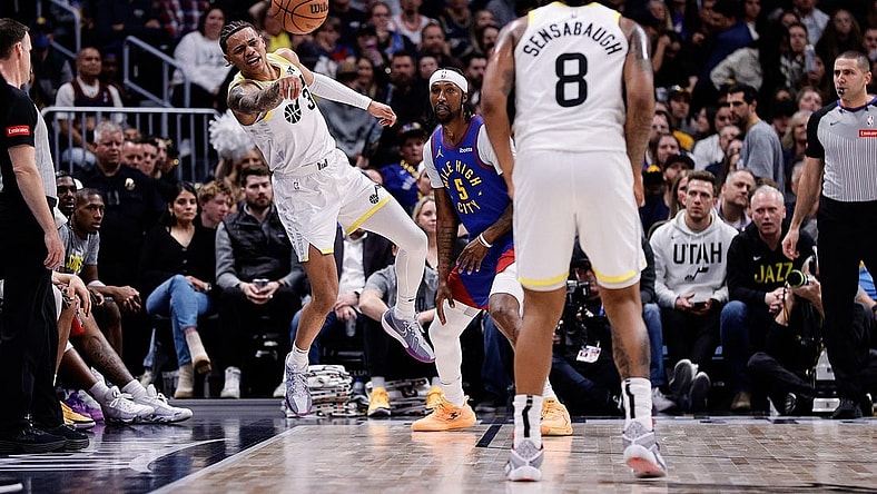 Mar 9, 2024; Denver, Colorado, USA; Utah Jazz guard Keyonte George (3) passes the ball to forward Brice Sensabaugh (8) as Denver Nuggets guard Kentavious Caldwell-Pope (5) defends in the third quarter at Ball Arena. Mandatory Credit: Isaiah J. Downing-USA TODAY Sports