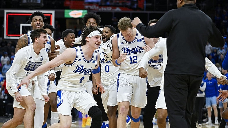 Mar 10, 2024; St. Louis, MO, USA;  Drake Bulldogs celebrate after defeating the Indiana State Sycamores to win the Missouri Valley Conference Tournament Championship at Enterprise Center. Mandatory Credit: Jeff Curry-USA TODAY Sports