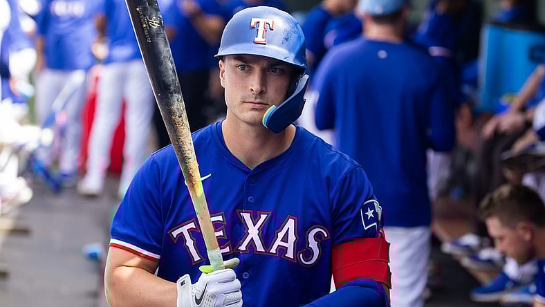 Mar 18, 2024; Surprise, Arizona, USA; Texas Rangers designated hitter Justin Foscue against the Seattle Mariners during a spring training baseball game at Surprise Stadium. Mandatory Credit: Mark J. Rebilas-USA TODAY Sports