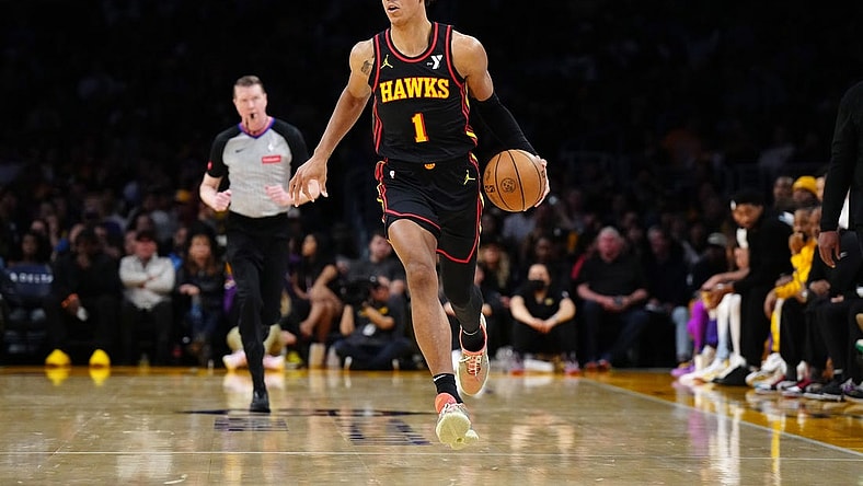 Mar 18, 2024; Los Angeles, California, USA; Atlanta Hawks forward Jalen Johnson (1) dribbles the ball against the Los Angeles Lakers in the first half at Crypto.com Arena. Mandatory Credit: Kirby Lee-USA TODAY Sports