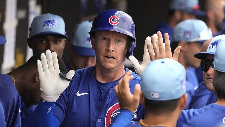 Mar 24, 2024; Peoria, Arizona, USA; Chicago Cubs left fielder Garrett Cooper (41) celebrates with teammates after hitting a home run against the Seattle Mariners in the third inning at Peoria Sports Complex. Mandatory Credit: Rick Scuteri-USA TODAY Sports