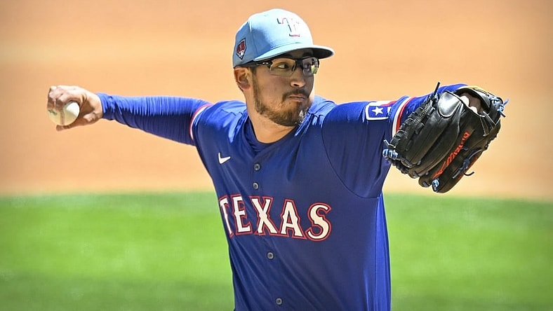 Mar 26, 2024; Arlington, Texas, USA; Texas Rangers starting pitcher Dane Dunning (33) pitches against the Boston Red Sox during the first inning at Globe Life Field. Mandatory Credit: Jerome Miron-USA TODAY Sports