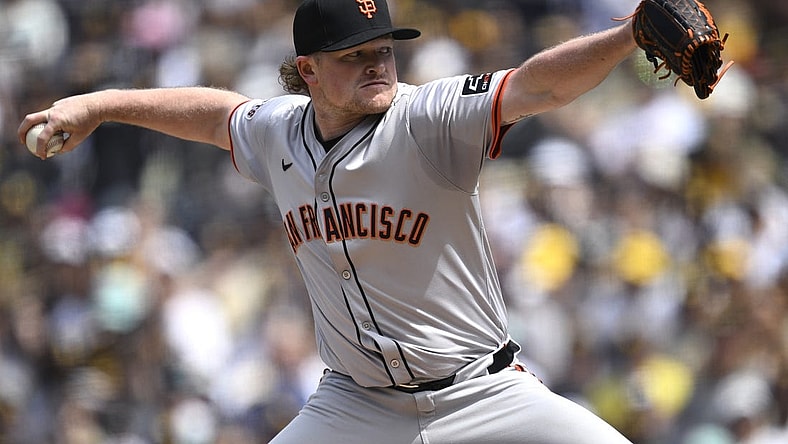 Mar 28, 2024; San Diego, California, USA; San Francisco Giants starting pitcher Logan Webb (62) throws a pitch against the San Diego Padres during the first inning at Petco Park. Mandatory Credit: Orlando Ramirez-USA TODAY Sports