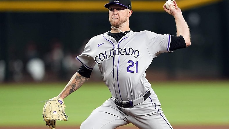 Mar 28, 2024; Phoenix, Arizona, USA; Colorado Rockies starting pitcher Kyle Freeland (21) pitches against the Arizona Diamondbacks during the first inning at Chase Field. Mandatory Credit: Joe Camporeale-USA TODAY Sports