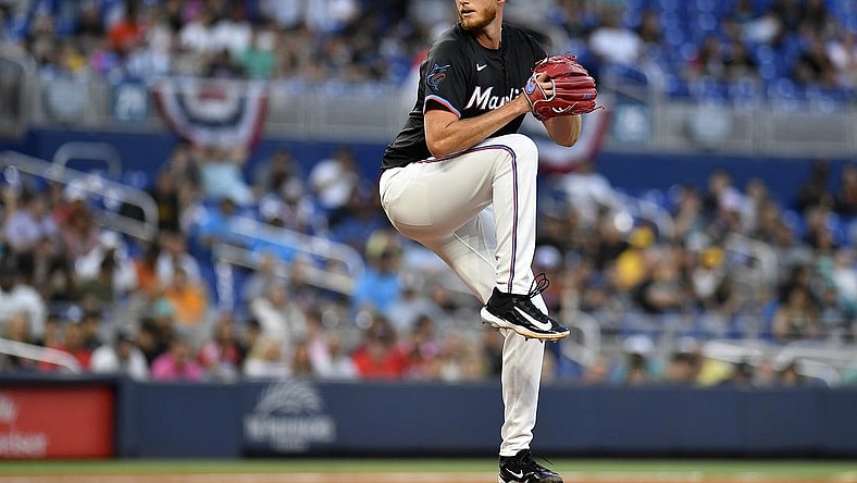 Mar 29, 2024; Miami, Florida, USA;  Miami Marlins starting pitcher A.J. Puk (35) winds up to throw a pitch during the first inning against the Pittsburgh Pirates at loanDepot Park. Mandatory Credit: Michael Laughlin-USA TODAY Sports