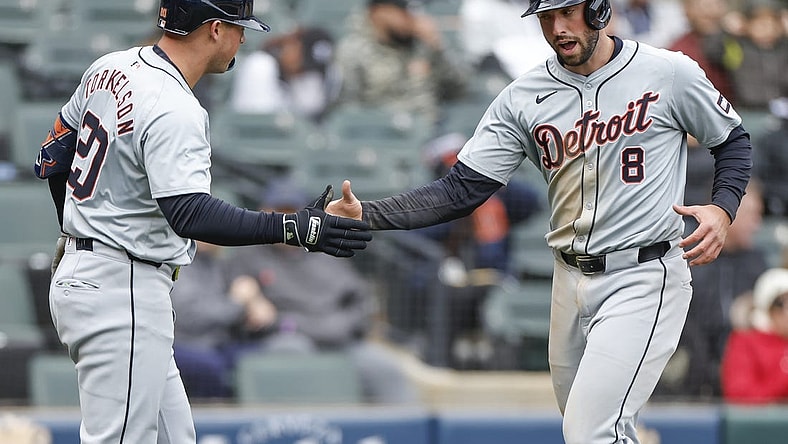 Mar 31, 2024; Chicago, Illinois, USA; Detroit Tigers right fielder Matt Vierling (8) celebrates with first baseman Spencer Torkelson (20) after scoring against the Chicago White Sox during the ninth inning at Guaranteed Rate Field. Mandatory Credit: Kamil Krzaczynski-USA TODAY Sports