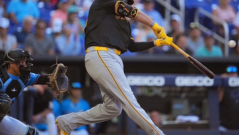 Mar 31, 2024; Miami, Florida, USA;  Pittsburgh Pirates first baseman Rowdy Tellez (44) hits a two-run home run in the seventh inning to give the Pirates the lead over the Miami Marlins at loanDepot Park. Mandatory Credit: Jim Rassol-USA TODAY Sports