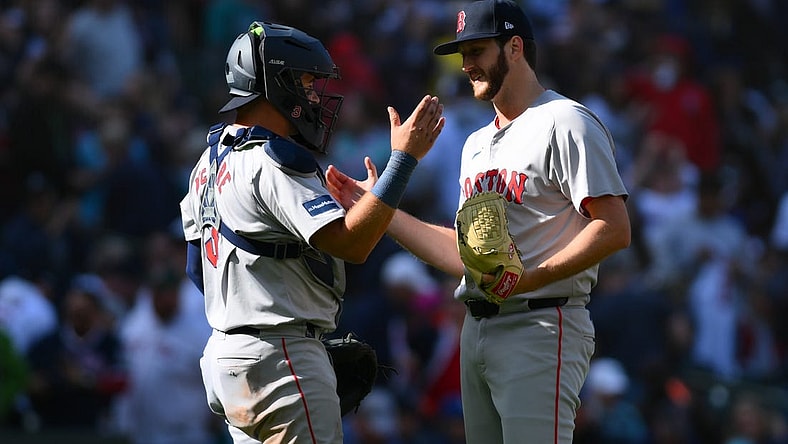 Mar 31, 2024; Seattle, Washington, USA; Boston Red Sox catcher Reese McGuire (3) and relief pitcher Justin Slaten (63) celebrate defeating the Seattle Mariners at T-Mobile Park. Mandatory Credit: Steven Bisig-USA TODAY Sports