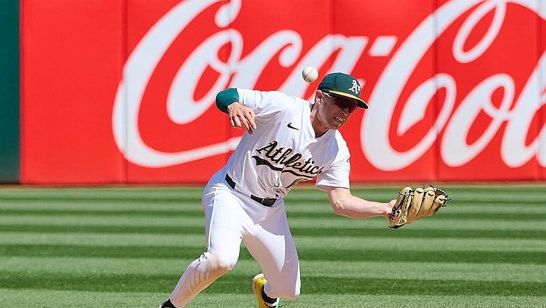 Mar 31, 2024; Oakland, California, USA; Oakland Athletics infielder Nick Allen (10) makes an error against the Cleveland Guardians during the eighth inning at Oakland-Alameda County Coliseum. Mandatory Credit: Robert Edwards-USA TODAY Sports