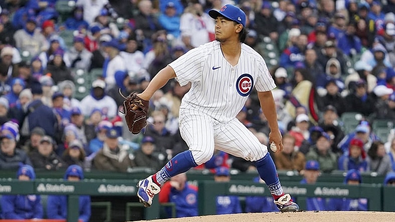 Apr 1, 2024; Chicago, Illinois, USA; Chicago Cubs starting pitcher Shota Imanaga (18) pitches against the Colorado Rockies during the first inning at Wrigley Field. Mandatory Credit: David Banks-USA TODAY Sports
